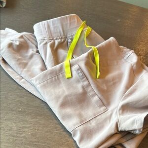 Figs top and joggers in beige/ vibrant neon yellow tie
